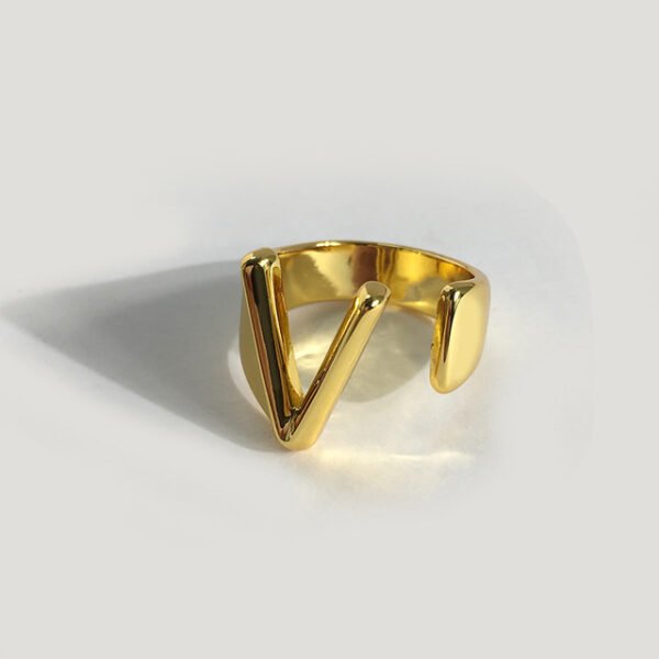 Gold initial ring - V